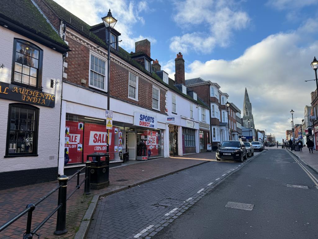 Lot: 176 - TOWN CENTRE PROPERTY WITH PLANNING FOR EIGHT FLATS AND TWO COMMERCIAL UNITS - View of high street